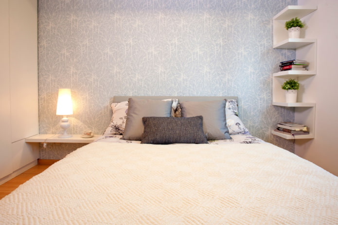 shelves above the bed in the interior of the bedroom