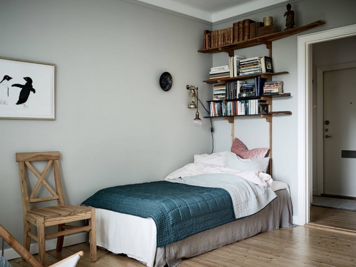 shelves for books above the bed in the interior