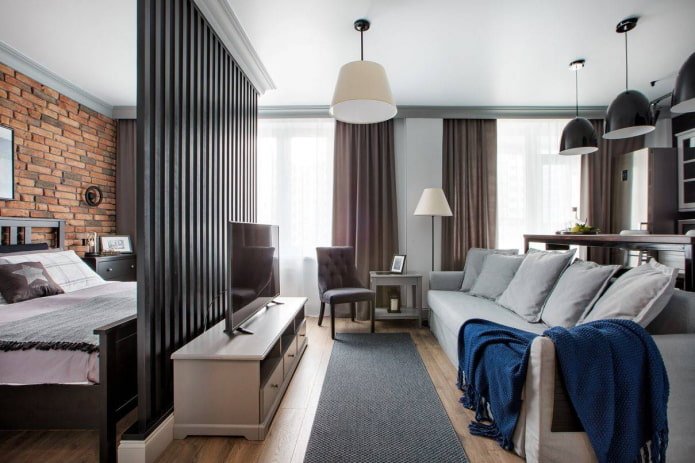 Studio with a bed behind a partition Studio with a bed behind a partition