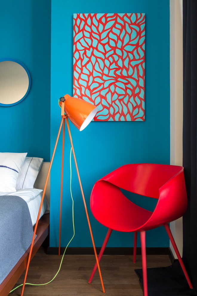 Red armchair and painting