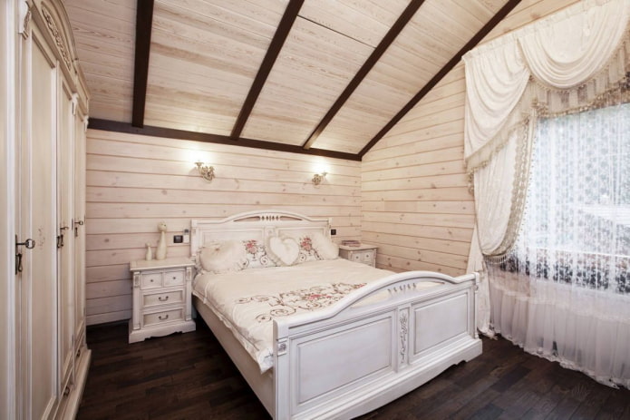 Provence style attic bedroom interior