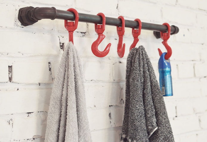 Hanger made of pipes and hooks Hanger made of pipes and hooks