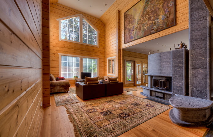 design of a log house with a second light design of a log house with a second light