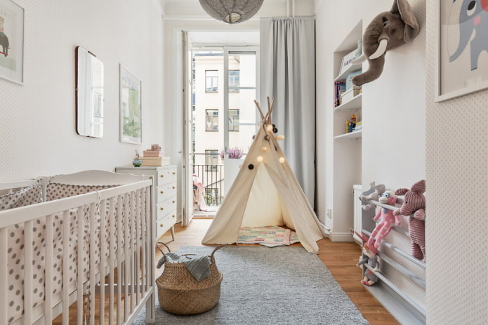 interior of a nursery for a boy in a nordic style