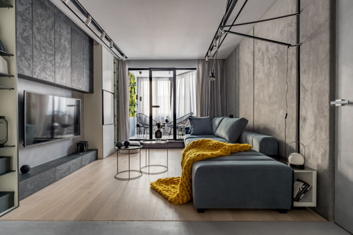 Gray living room with a bright blanket Gray living room with a bright blanket