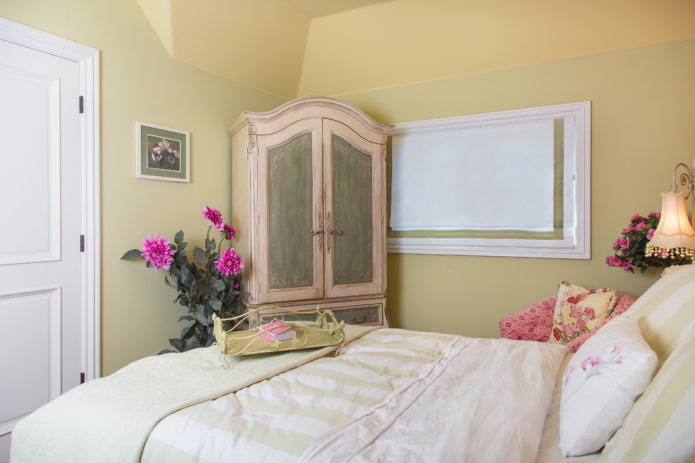 furnishings in the interior of the bedroom in yellow tones furnishings in the interior of the bedroom in yellow tones