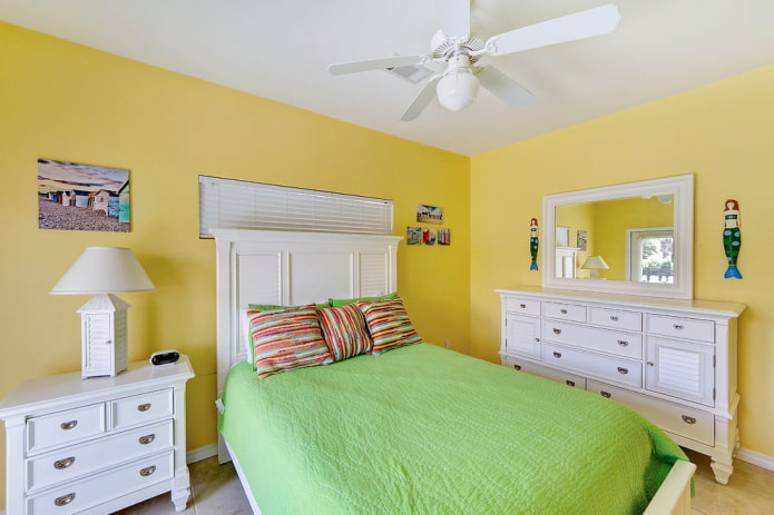furnishings in the interior of the bedroom in yellow tones furnishings in the interior of the bedroom in yellow tones