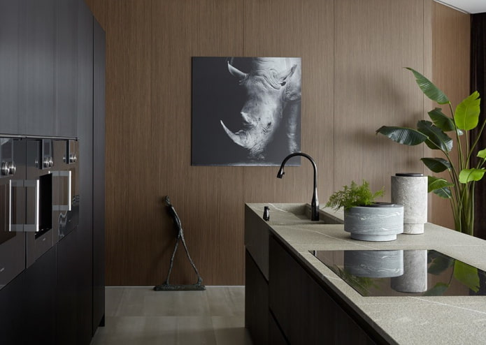 island with a sink in the interior of the kitchen