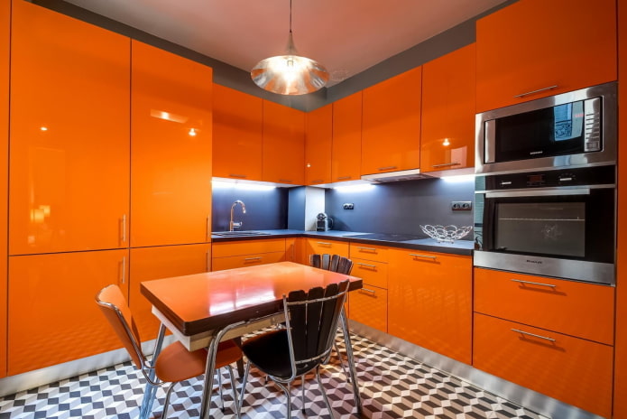kitchen interior in gray-orange colors kitchen interior in gray-orange colors