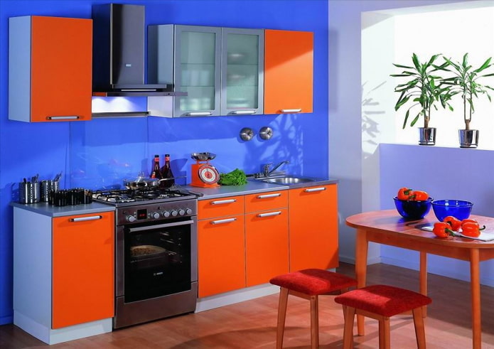 kitchen interior in orange and blue tones kitchen interior in orange and blue tones