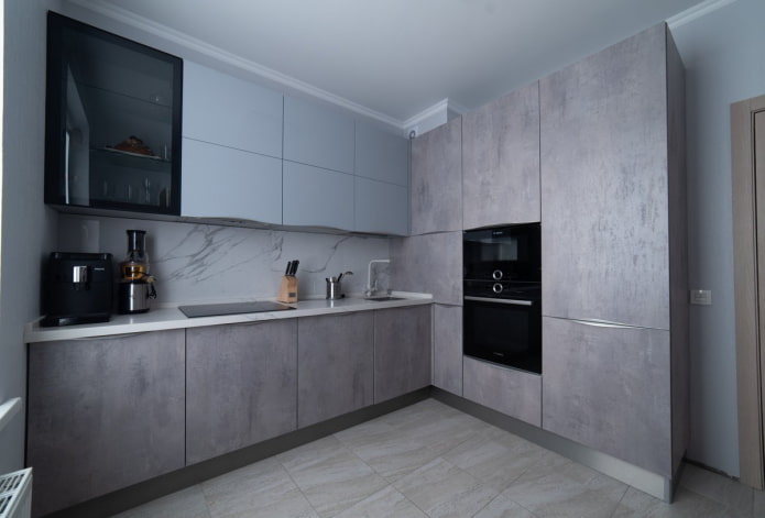 finishing in the interior of the kitchen in gray tones