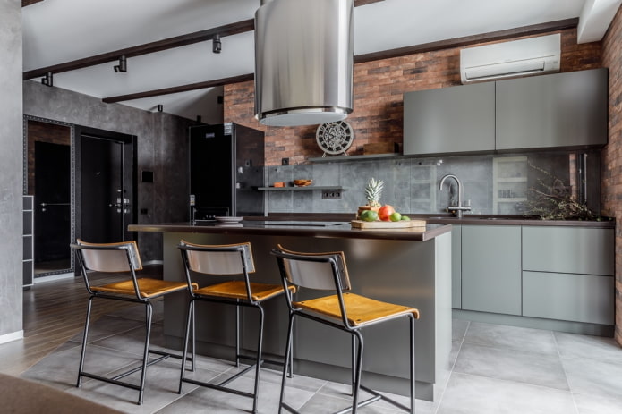 finishing in the interior of the kitchen in gray tones