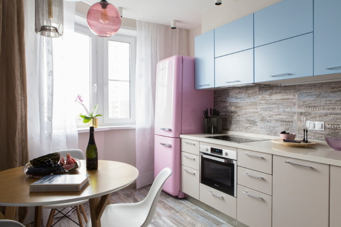 refrigerator near the window in the interior of the kitchen refrigerator near the window in the interior of the kitchen