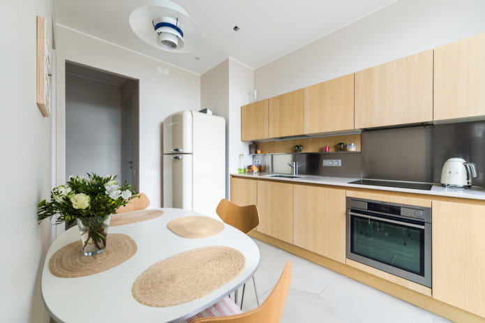 refrigerator at the entrance to the interior of the kitchen refrigerator at the entrance to the interior of the kitchen