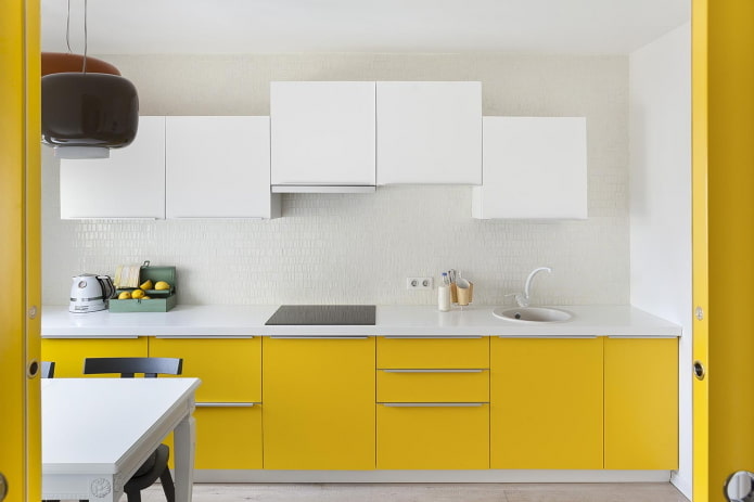 kitchen interior in yellow and white colors kitchen interior in yellow and white colors