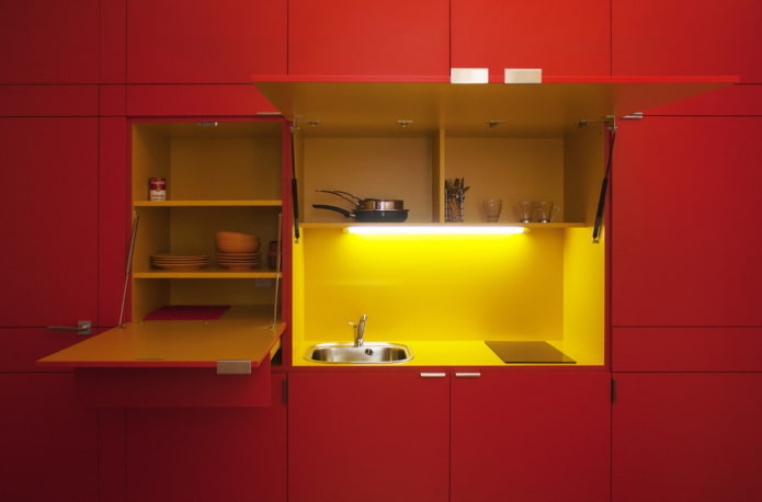 kitchen interior in yellow and red colors kitchen interior in yellow and red colors
