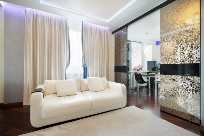 zoning with sliding doors in the interior of the kitchen-living room