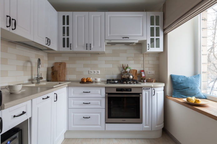 cooking zone in the interior of the kitchen in the shape of an angle