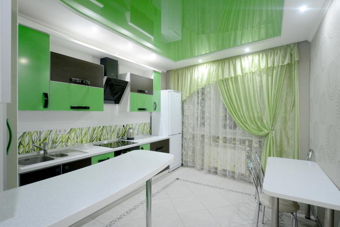 curtains in the interior of the kitchen in light green tones