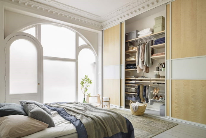 filling the wardrobe in the bedroom interior filling the wardrobe in the bedroom interior