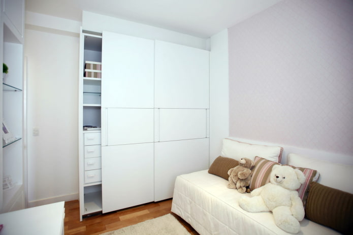 White built-in wardrobe in the nursery White built-in wardrobe in the nursery