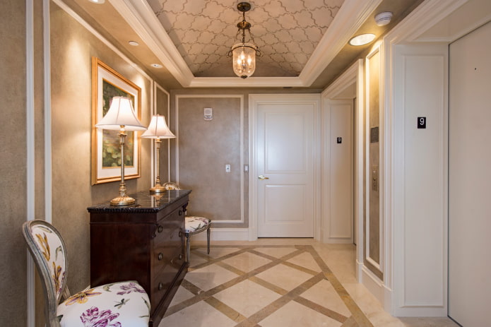 decorating a chest of drawers in the interior of the corridor