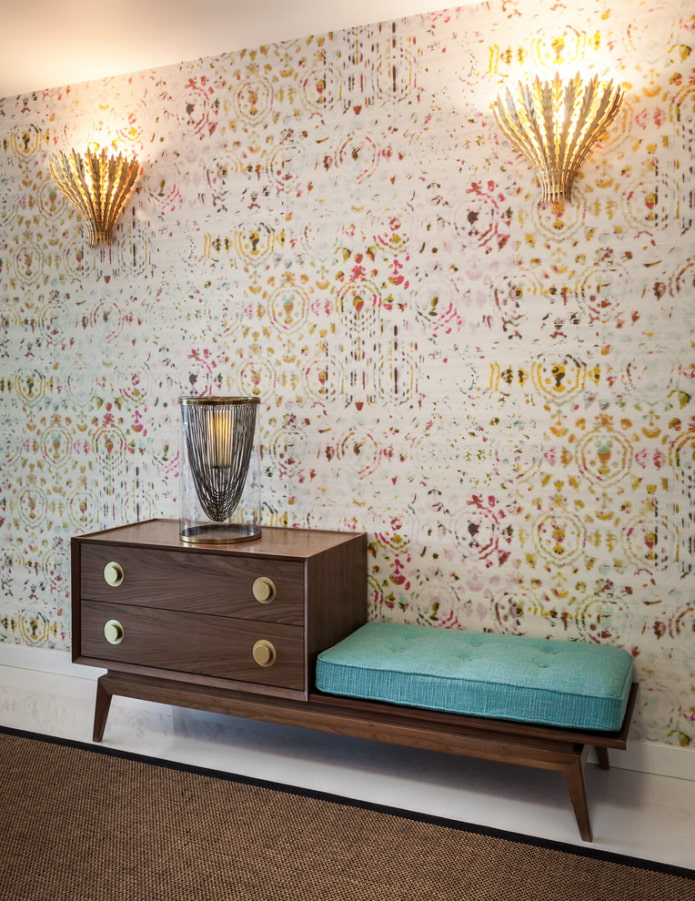 chest of drawers with a bench in the interior of the corridor