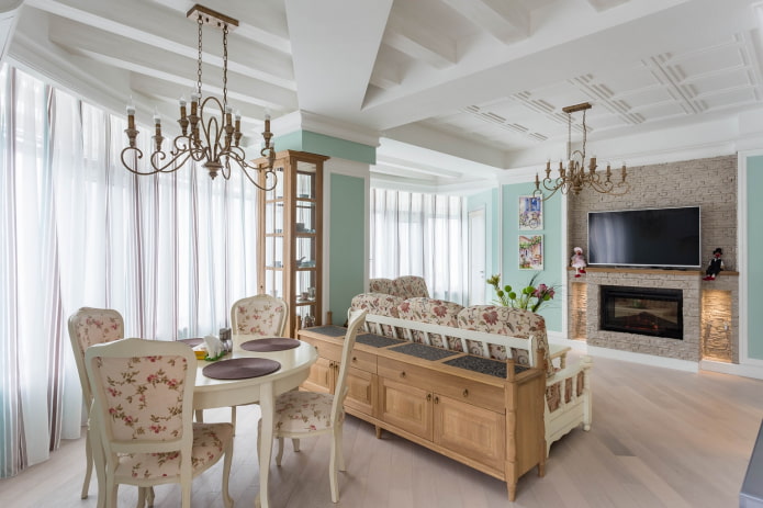 zoning of the kitchen-living room in the Provencal style