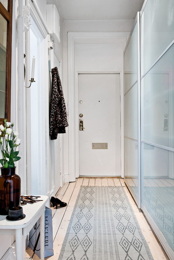 design of a narrow Scandinavian hallway