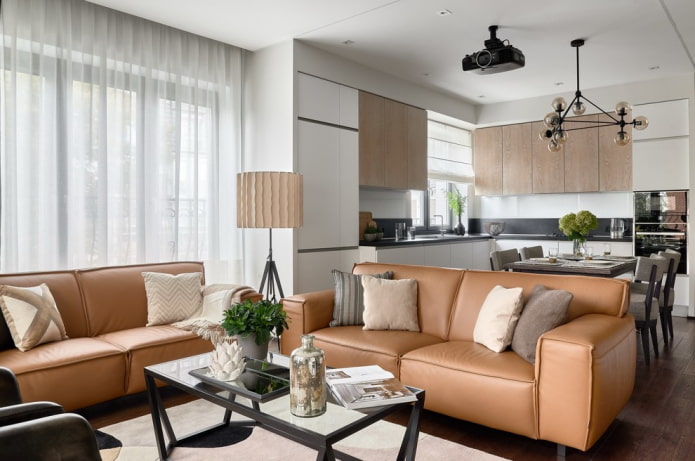arrangement of furniture in the interior of the kitchen-living room