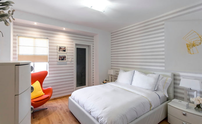 Wallpaper with horizontal stripes in the bedroom