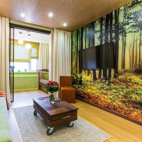 wall behind the TV decorated with photo wallpaper