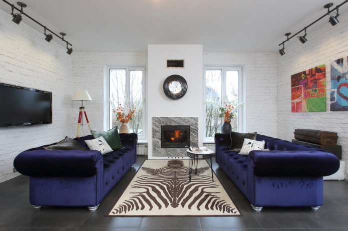 fireplace between the windows in the interior of the living room