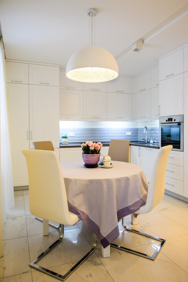 chandelier on the ceiling in the interior of the kitchen