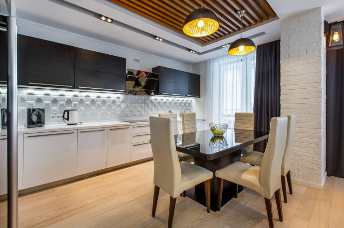 two chandeliers on the ceiling in the interior of the kitchen