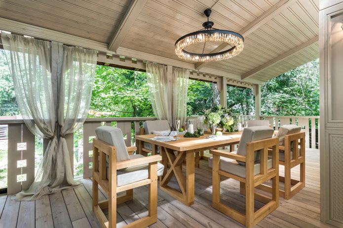 chandelier in the design of a summer kitchen