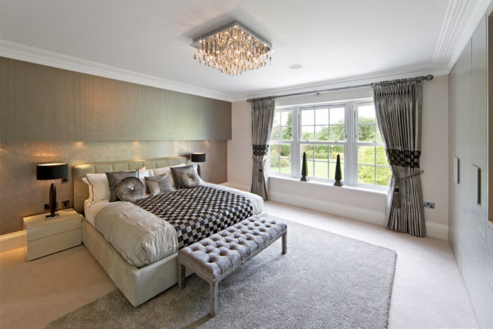 chandelier on the ceiling in the interior of the bedroom