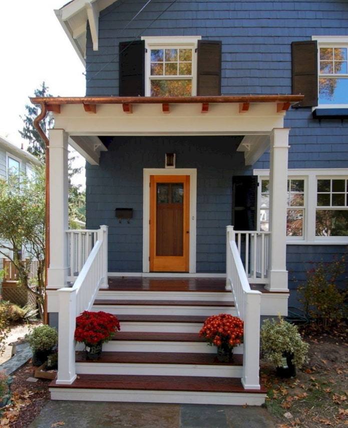 house with a porch with a canopy