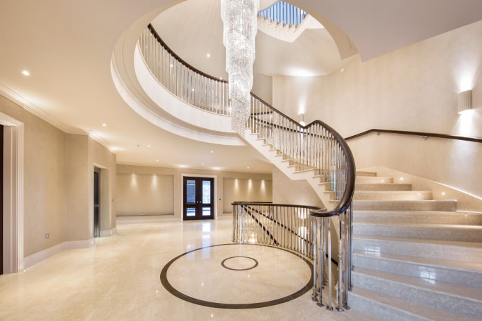chandelier over the stairs in the interior of the house chandelier over the stairs in the interior of the house