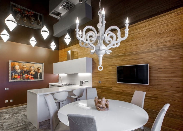 stretch ceiling with a chandelier in the interior of the kitchen