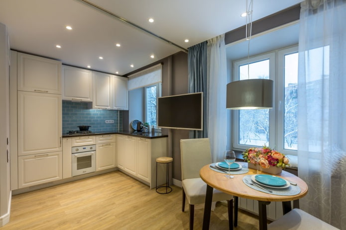 spotlights on a stretch ceiling in the interior of the kitchen