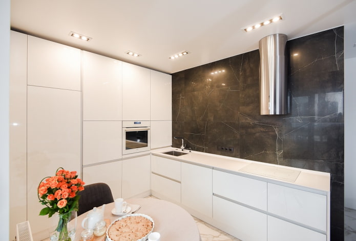 stretch ceiling lighting in the interior of a small kitchen