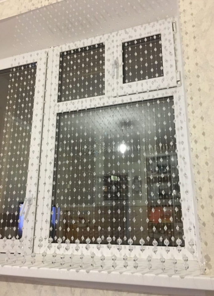 design of filament curtains in the interior of the kitchen