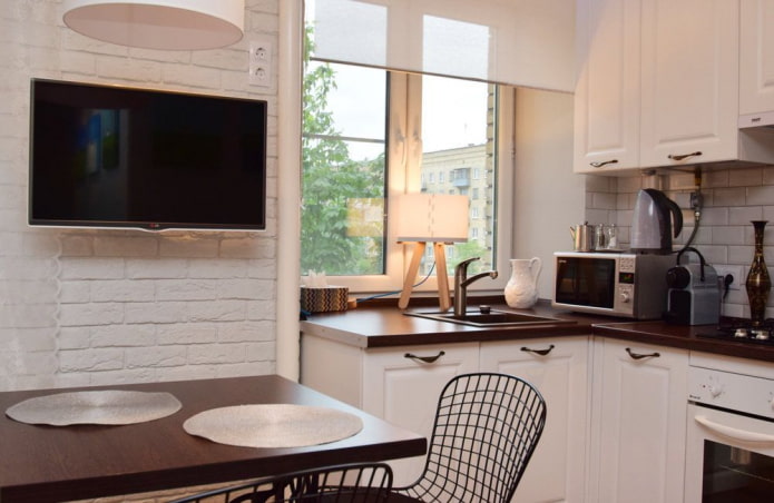 TV in the interior of a small kitchen TV in the interior of a small kitchen
