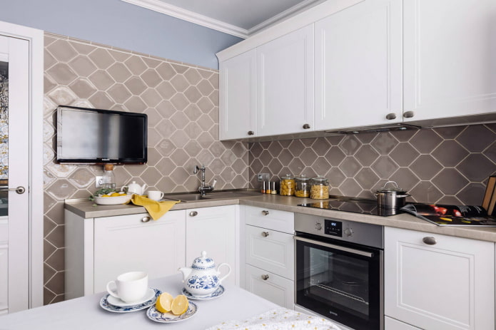 TV in the interior of a small kitchen TV in the interior of a small kitchen