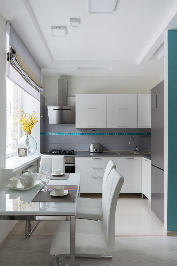 white kitchen with an accent white kitchen with an accent