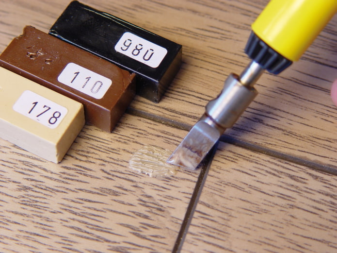 sealing laminate joints with wax