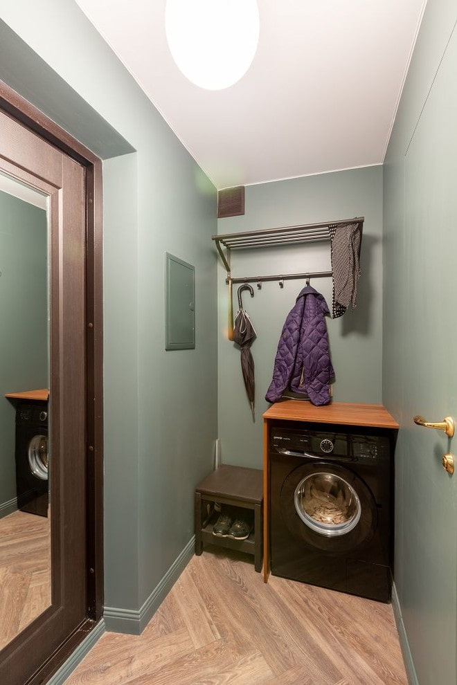 Washing machine in the hallway