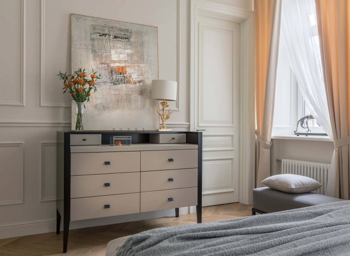 chest of drawers opposite the bed