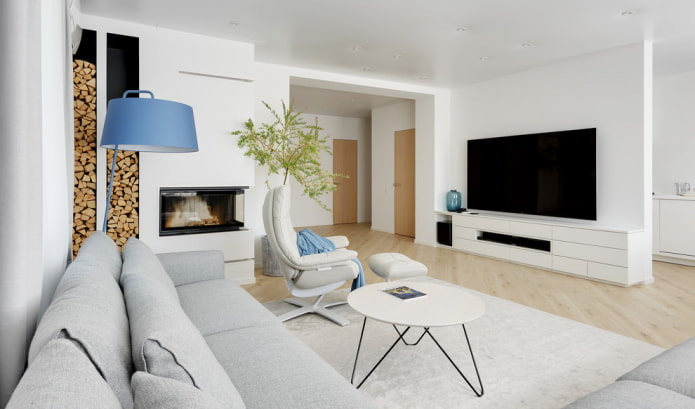 living room with built-in fireplace and firewood compartment